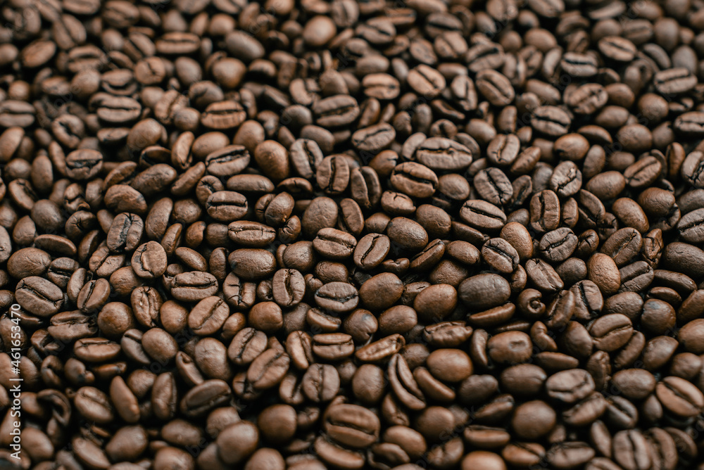Fresh roasted coffee beans pattern, texture, goog morning background Fresh roasted coffee beans pattern, texture, goog morning background