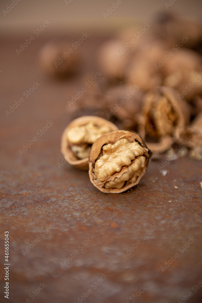 Walnuts on rustic plate at Autumn Walnuts on rustic plate at Autumn