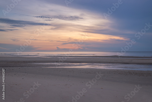 Early morning sunrise over the sea. Beach  Copy space  Selective focus.