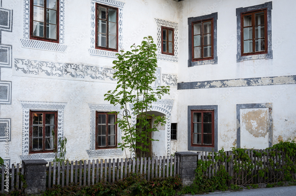 Fototapeta premium Old white abandoned house, cloudy day in summer