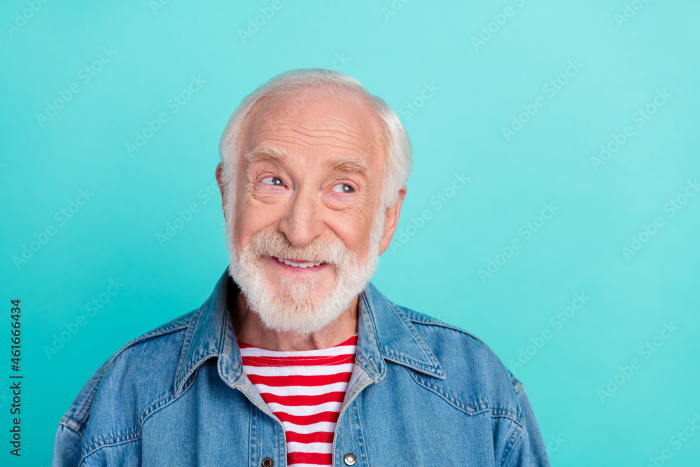Portrait of attractive cheerful curious grey-haired man creating solution copy space isolated over bright teal turquoise color background Portrait of attractive cheerful curious grey-haired man creating solution copy space isolated over bright teal turquoise color background