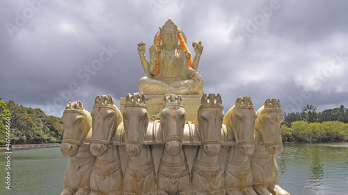 Shrine of Surya at the Grand Bassin under a stormy sky in Mauritius photo