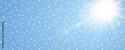 sunny winte sky background with snowflakes and copy space
