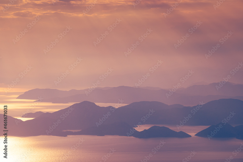 beautiful aerial panorama of mountains islands and sea at sunset
