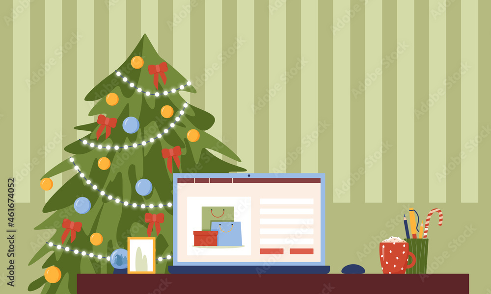 Laptop on the table against the background of a Christmas tree. Online shopping, buying a gift for Christmas.