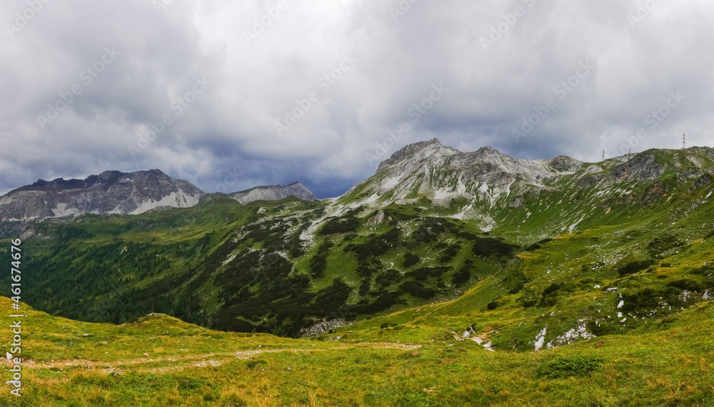 view to amazing green mountain nature landscape with dense rain clouds panorama view to amazing green mountain nature landscape with dense rain clouds panorama