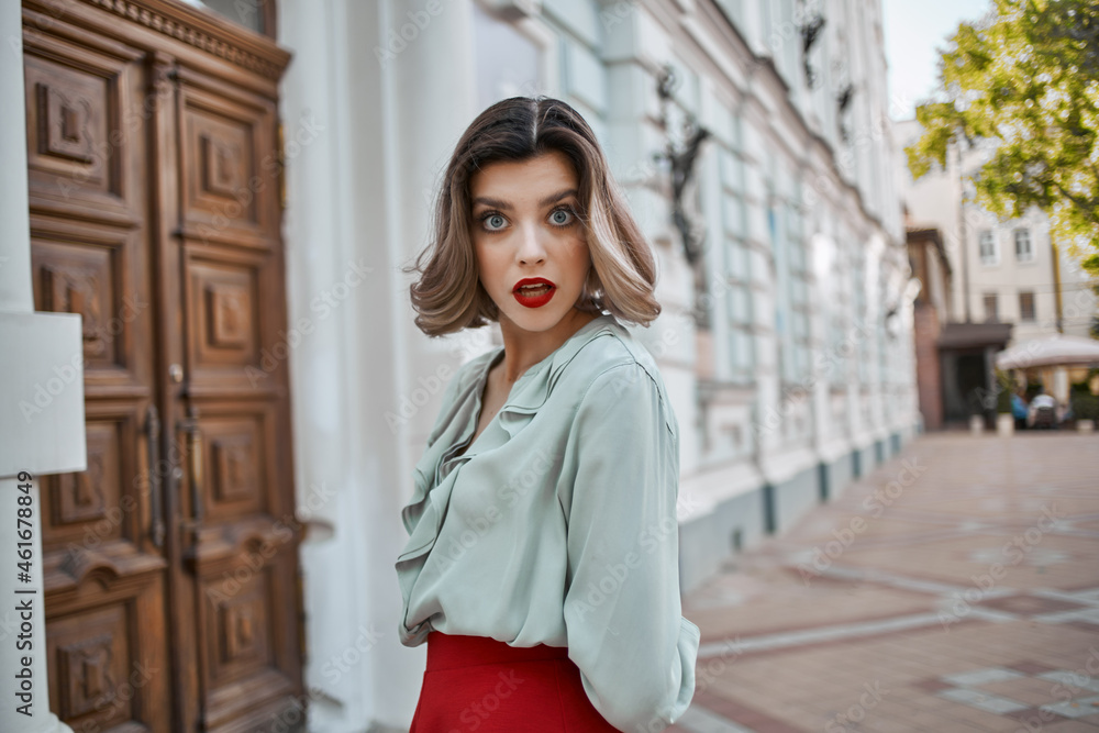 pretty woman in a red skirt city walk fun leisure Fresh air pretty woman in a red skirt city walk fun leisure Fresh air