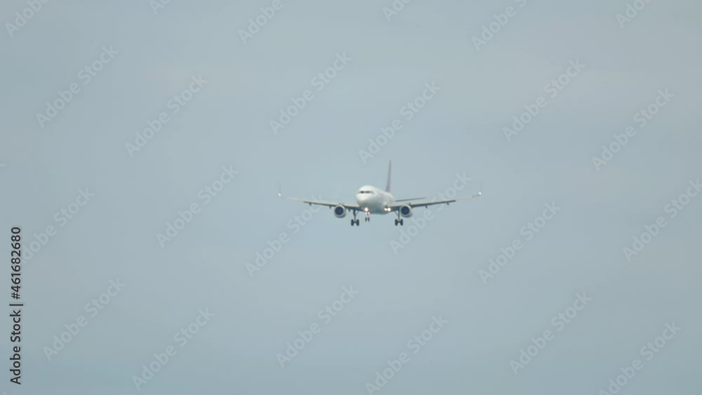 Airliner flying in the blue sky Airliner flying in the blue sky