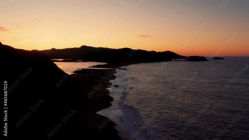 Aerial: Sunrise over Goat Rock Beach at Jenner on the Mendocino Coastline. California, USA Aerial: Sunrise over Goat Rock Beach at Jenner on the Mendocino Coastline. California, USA