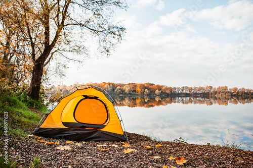 tent at the beach of the lake autumn fall season