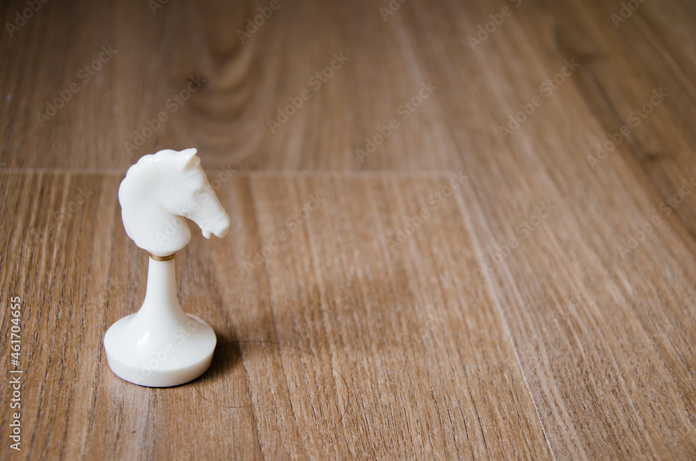 white chess horse stands on the table white chess horse stands on the table