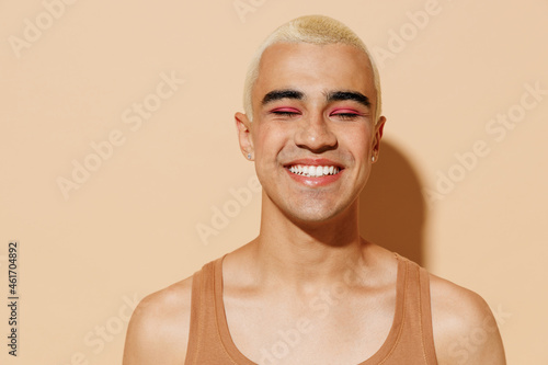Картината върху платно Young smiling fun happy blond latin american hispanic gay man with make up close