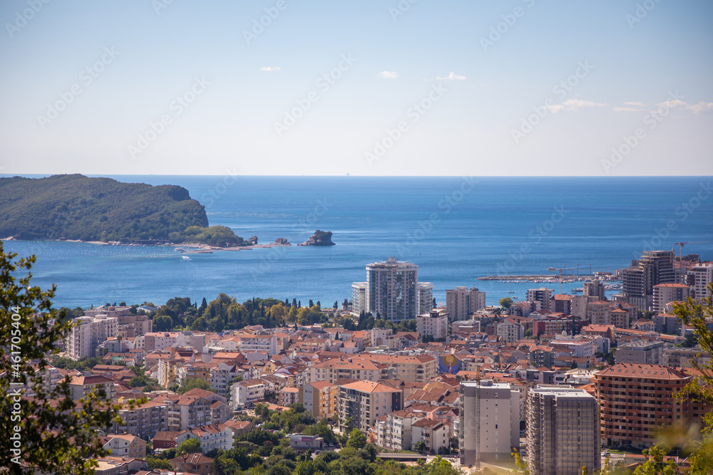 Aerial view at the Budva city with modern buildings and sea. Montenegro, Europe