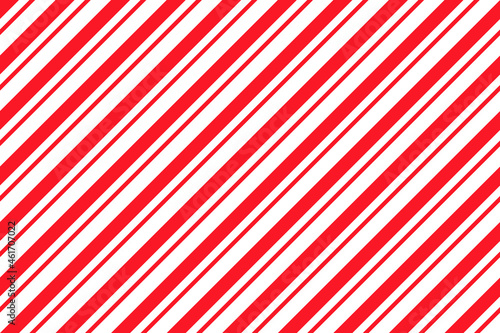 Candy cane seamless pattern. Christmas striped red background. Cute caramel package print. Xmas holiday diagonal lines. Peppermint wrapping texture. Abstract geometric wallpaper. Vector illustration. photo