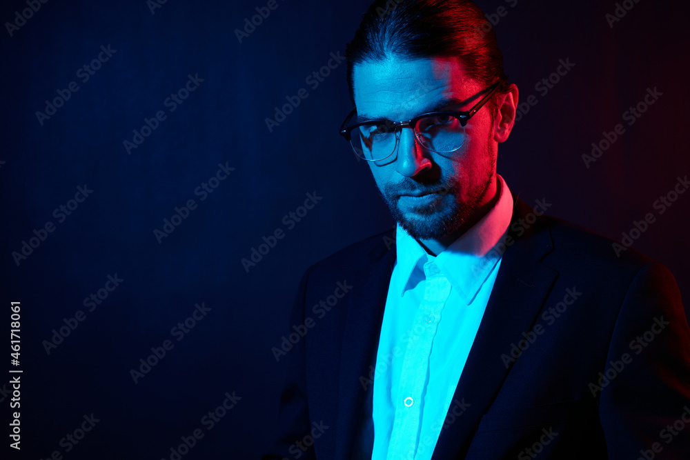 stylish man in costume posing fashion with glasses neon light stylish man in costume posing fashion with glasses neon light