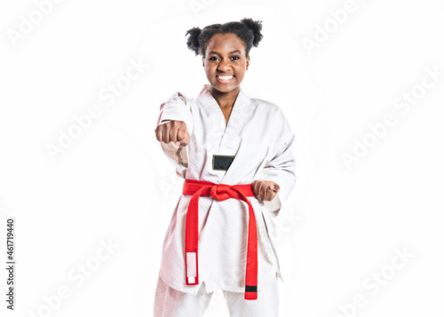 Young black belt karate fighter training Isolated portrait on white background