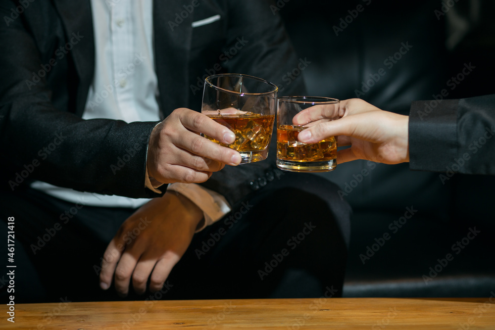Businessmen in suits drinking Celebrate whiskey Businessmen in suits drinking Celebrate whiskey
