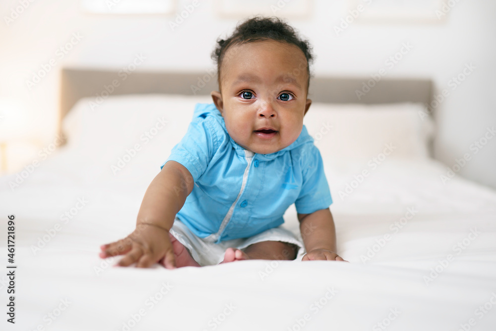 Cute black afro american Baby On Parent Bed Cute black afro american Baby On Parent Bed