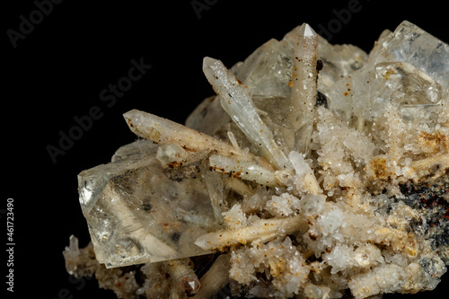 Macro mineral stone fluorite with quartz against black background