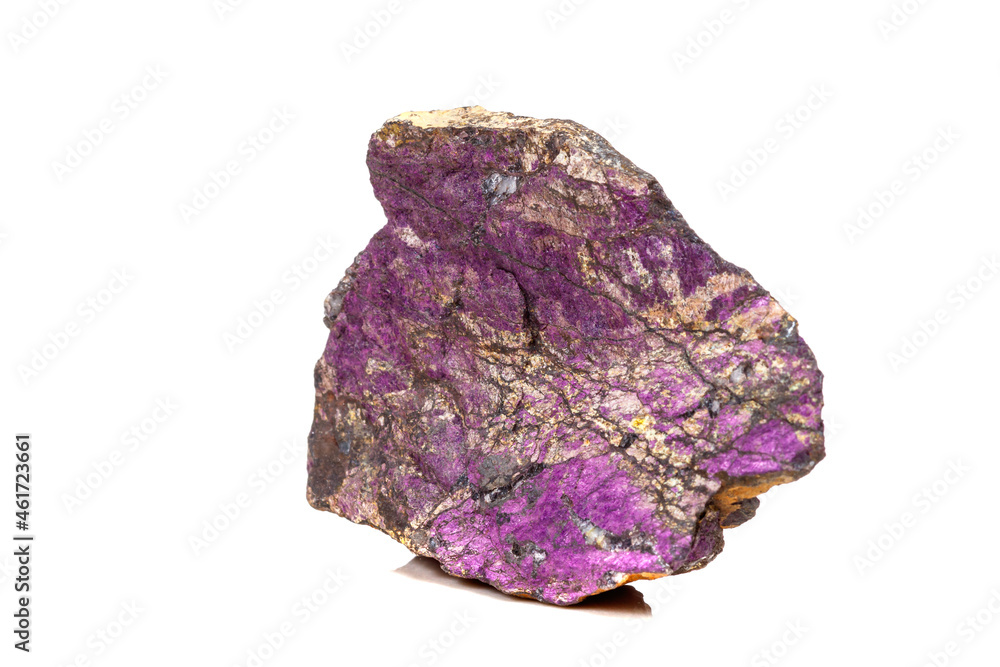 Macro mineral stone purpureus, (purple) purpurite in the breed a white background Macro mineral stone purpureus, (purple) purpurite in the breed a white background
