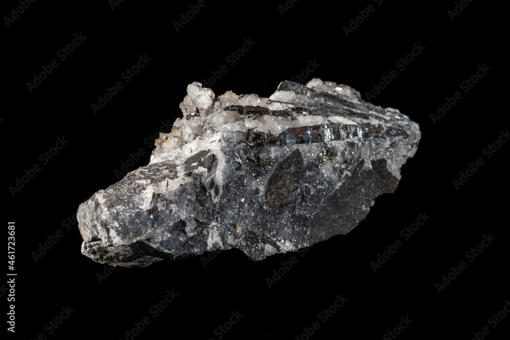 Macro mineral stone Stibnite quartz on a black background Macro mineral stone Stibnite quartz on a black background