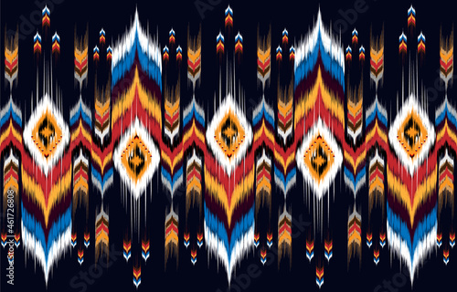 Fototapeta Naklejka Na Ścianę i Meble -  Ikat geometric folklore ornament. Tribal ethnic vector texture. 
Seamless striped pattern in Aztec style. Figure tribal embroidery. 
Indian, Scandinavian, Gyp
sy, Mexican, folk pattern.