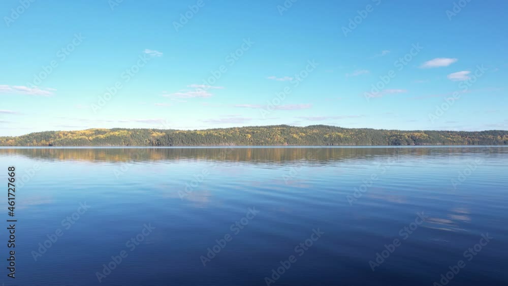 Aerial flight of autumn landscape with lake and mountains Aerial flight of autumn landscape with lake and mountains