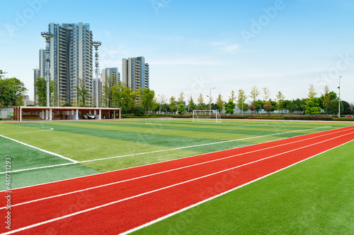 The football field and the cabin are in the park