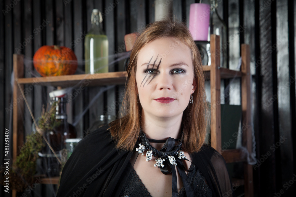 Portrait of young beautiful witch at Halloween Portrait of young beautiful witch at Halloween