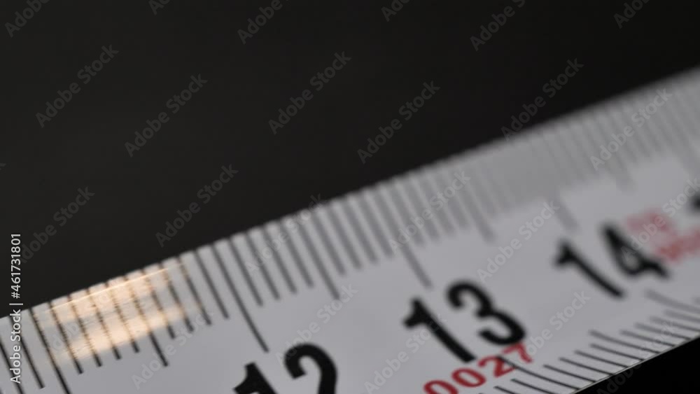 Tape measure. Sliding shot with nice depth of field. Macro shot. Close up. Tape measure. Sliding shot with nice depth of field. Macro shot. Close up.