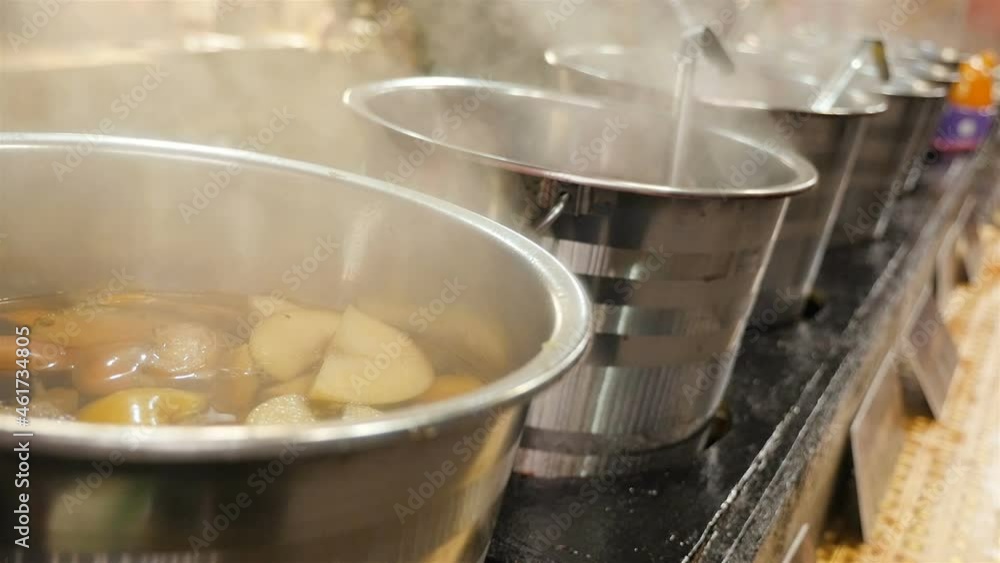 Mulled wine in a large bowl. New Year's atmosphere. Close-up Mulled wine in a large bowl. New Year's atmosphere. Close-up
