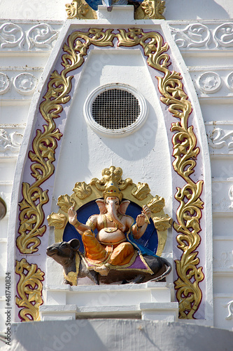 Sculpture of Ganesha sitting on his vehicle rat at Bada Ganapati Temple in Indore, India photo