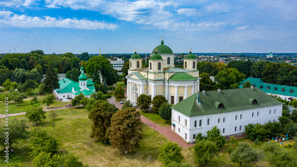 Bird's eye view of an old church in a village on a beautiful summer day. Picture from above an ancient church during day time