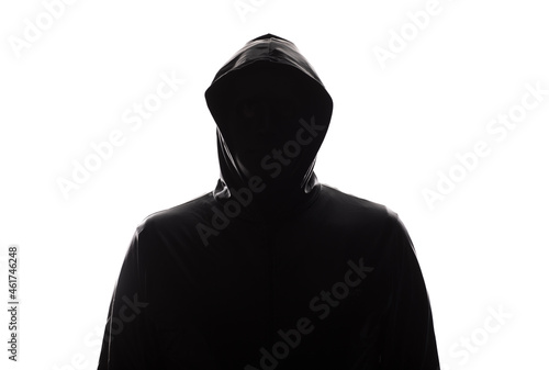 silhouette man in a hood isolated on white background