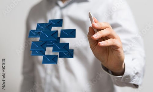 holding smartphone and checking email online on web with