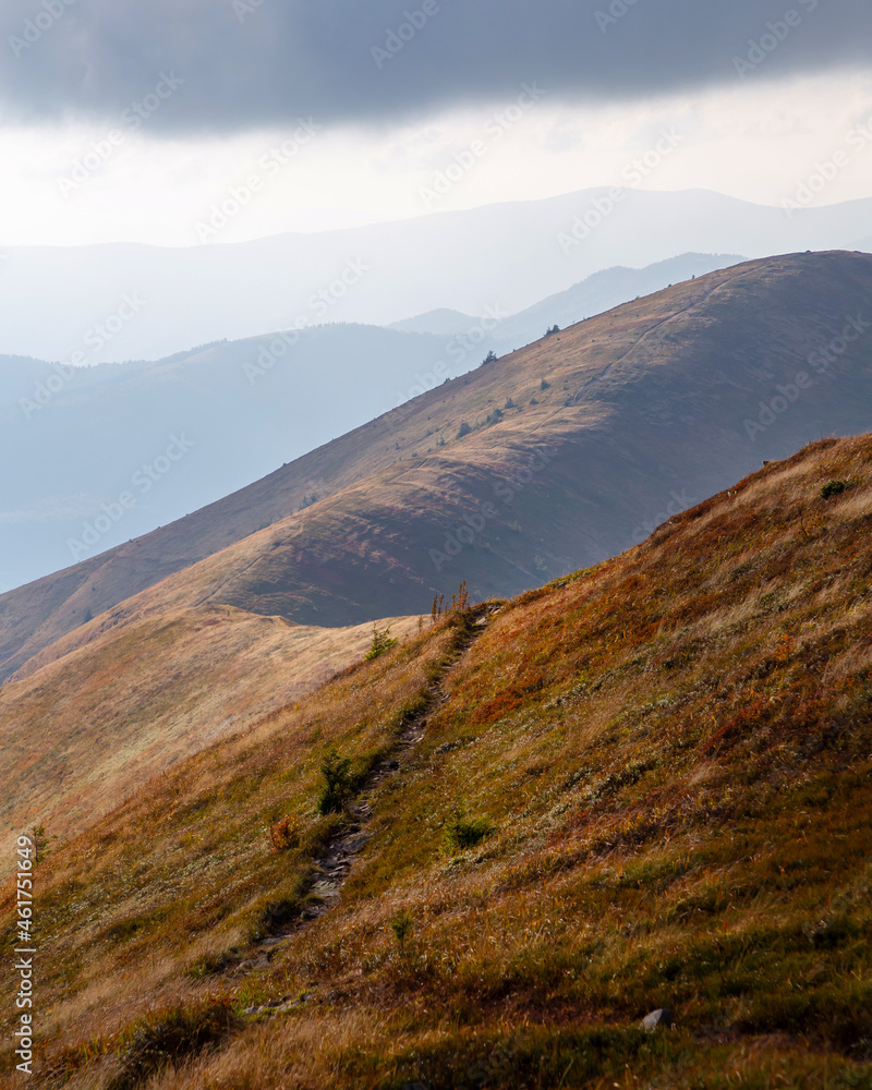 Beautiful autumn mountains in the Carpathians. A walk in the mountains in sunny weather.