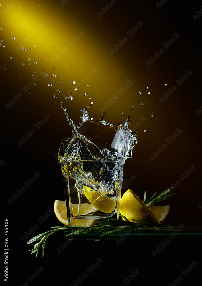 Сocktail with lemon slices and rosemary sprigs. - obrazy, fototapety, plakaty 