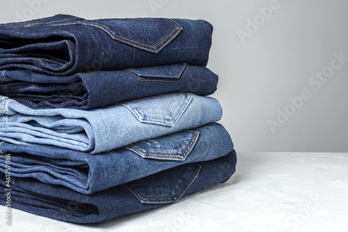 Canvastavla Blue jeans pants clothes pile background