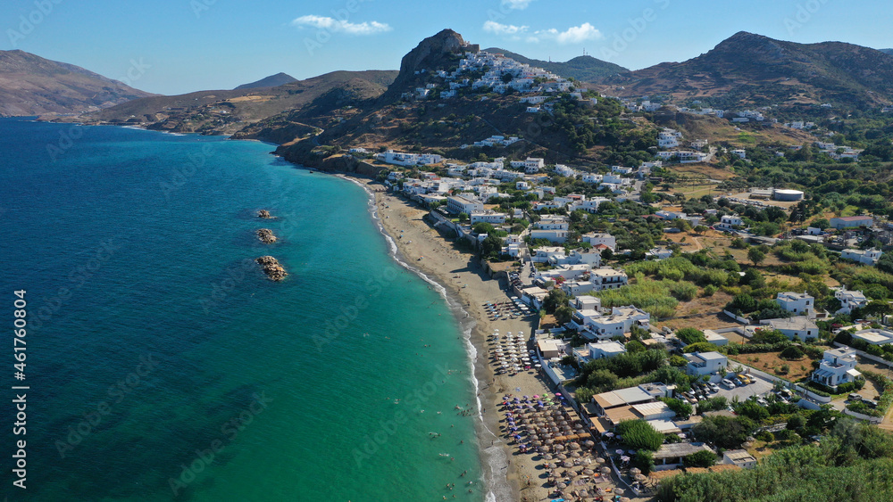 Aerial drone photo of main organised with sun beds and umbrellas sandy beach of Magazia with crystal clear Aegean sea, Skiros island, Sporades, Greece 