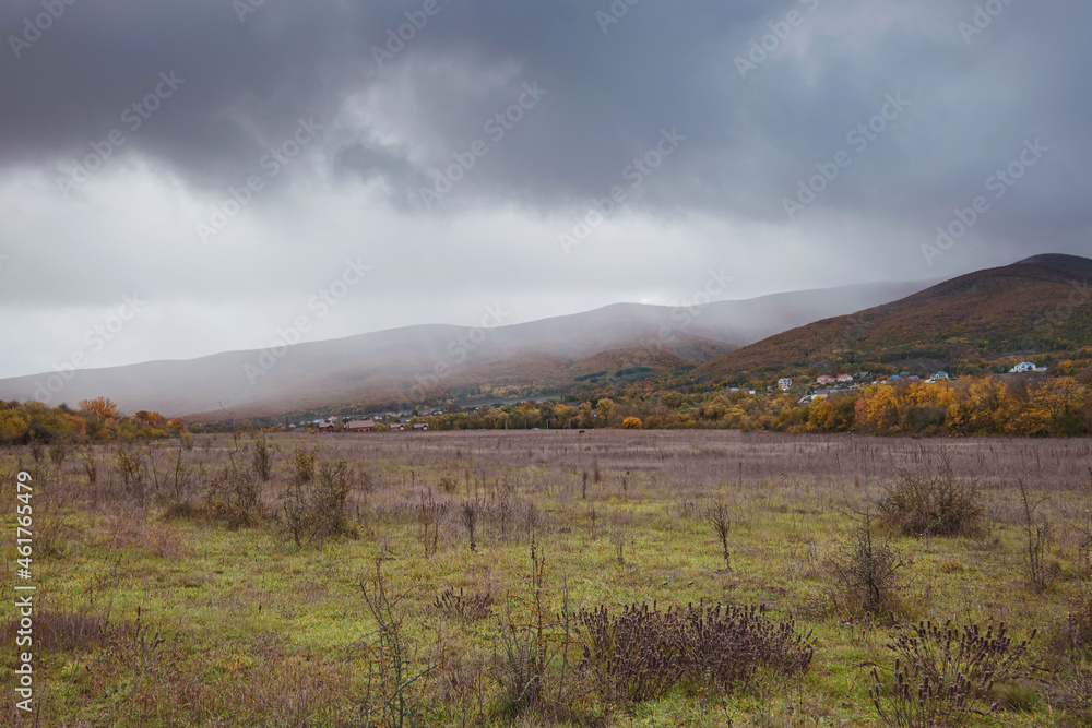 Fototapeta premium Fog is covering the valley. Atmospheric landscape. Nature, environmental conservation, ecology