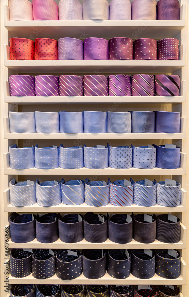 Ties on the shelf in a vertical photography