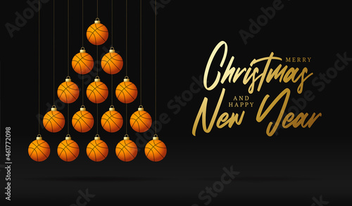 basketball Christmas and new year greeting card bauble tree. Creative Xmas tree made by basketball ball on black background for Christmas and New Year celebration. Sport greeting card