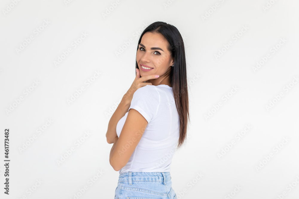 Young woman looking at camera toothy smiling isolated over white background Young woman looking at camera toothy smiling isolated over white background
