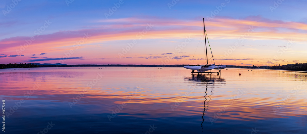 Trimaran dry docked on Brome Lake at sunrise, Quebec Canada Trimaran dry docked on Brome Lake at sunrise, Quebec Canada