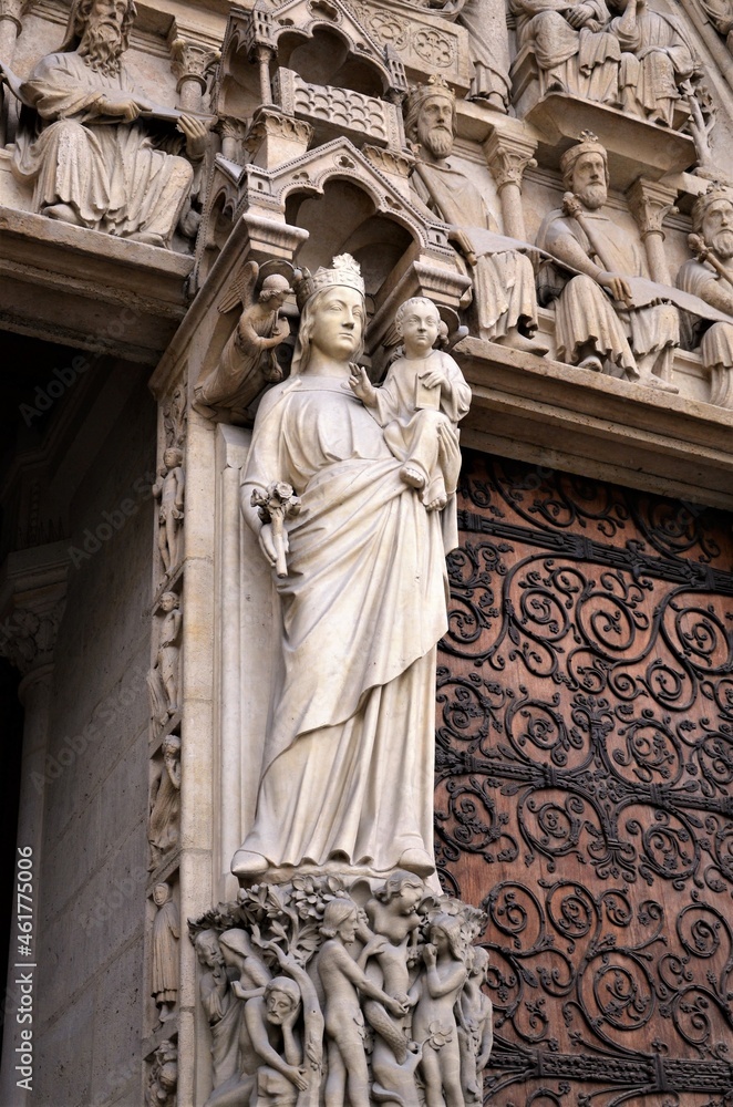 Paris, France - famous Notre Dame cathedral facade saint statues. UNESCO World Heritage Site