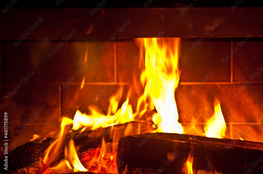 front view, close distance, of flames from a wood fire, in a fireplace, of a cabin, on a rainy evening, in Georgia mountains front view, close distance, of flames from a wood fire, in a fireplace, of a cabin, on a rainy evening, in Georgia mountains