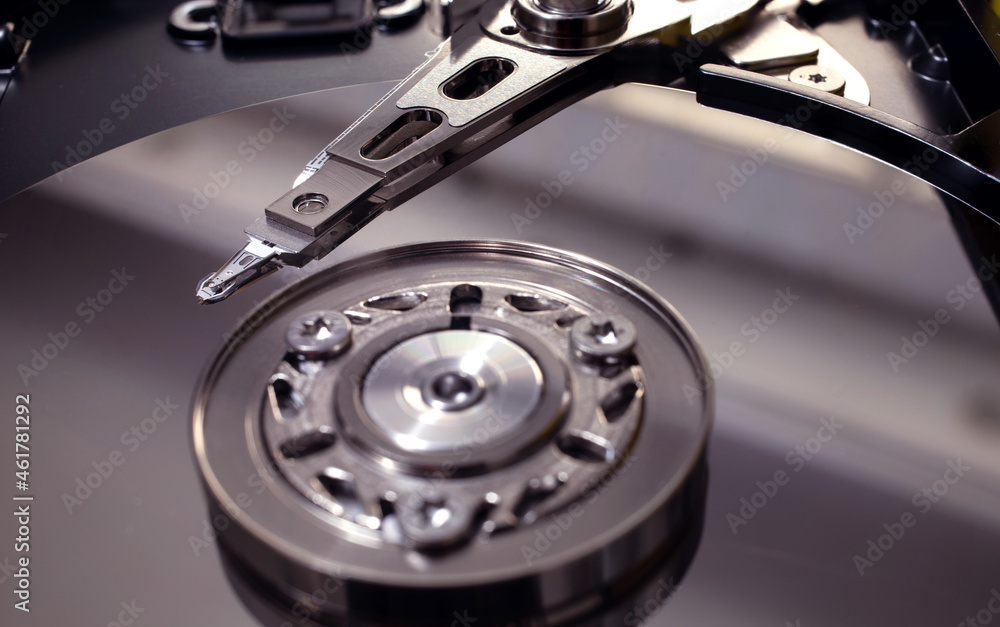 A macro shot of an open hard disk drive. A macro shot of an open hard disk drive.