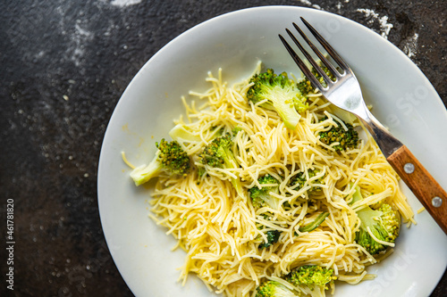 broccoli pasta fine vermicelli second course no meat fresh meal snack on the table copy space food background rustic. top view keto or paleo diet veggie vegan or vegetarian food