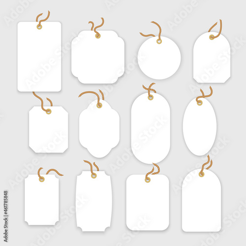 Blank white paper price tags or gift tags in different shapes. Set of labels with cord. Vector format
