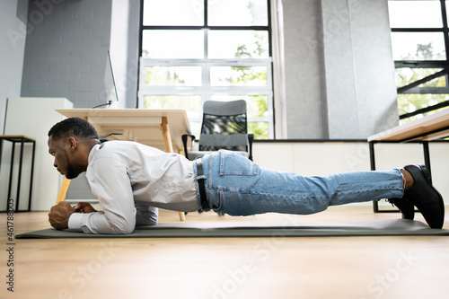 African American Doing Office Exercise Workout